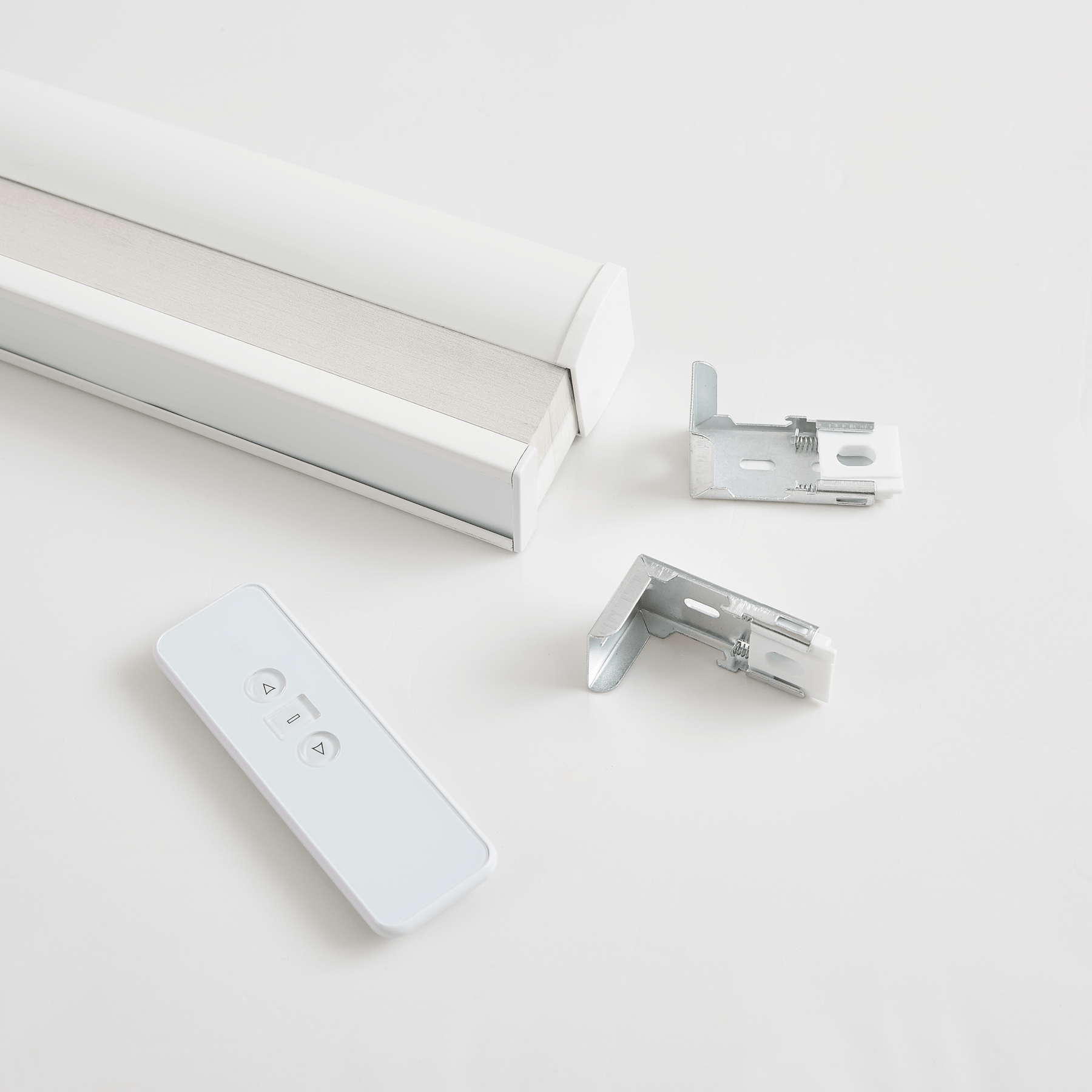 Remote control and hardware components for dual-core cellular shades featuring advanced insulation design.